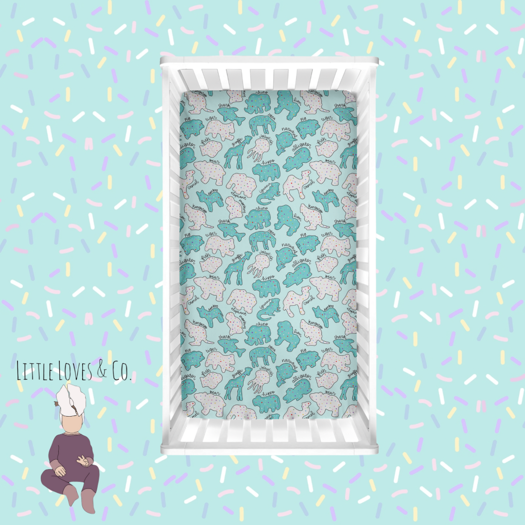 Safari sprinkes blue crib sheet